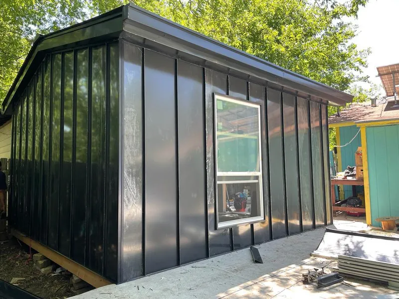 Black standing seam metal wall panels for Roof Inspection in Port Lavaca