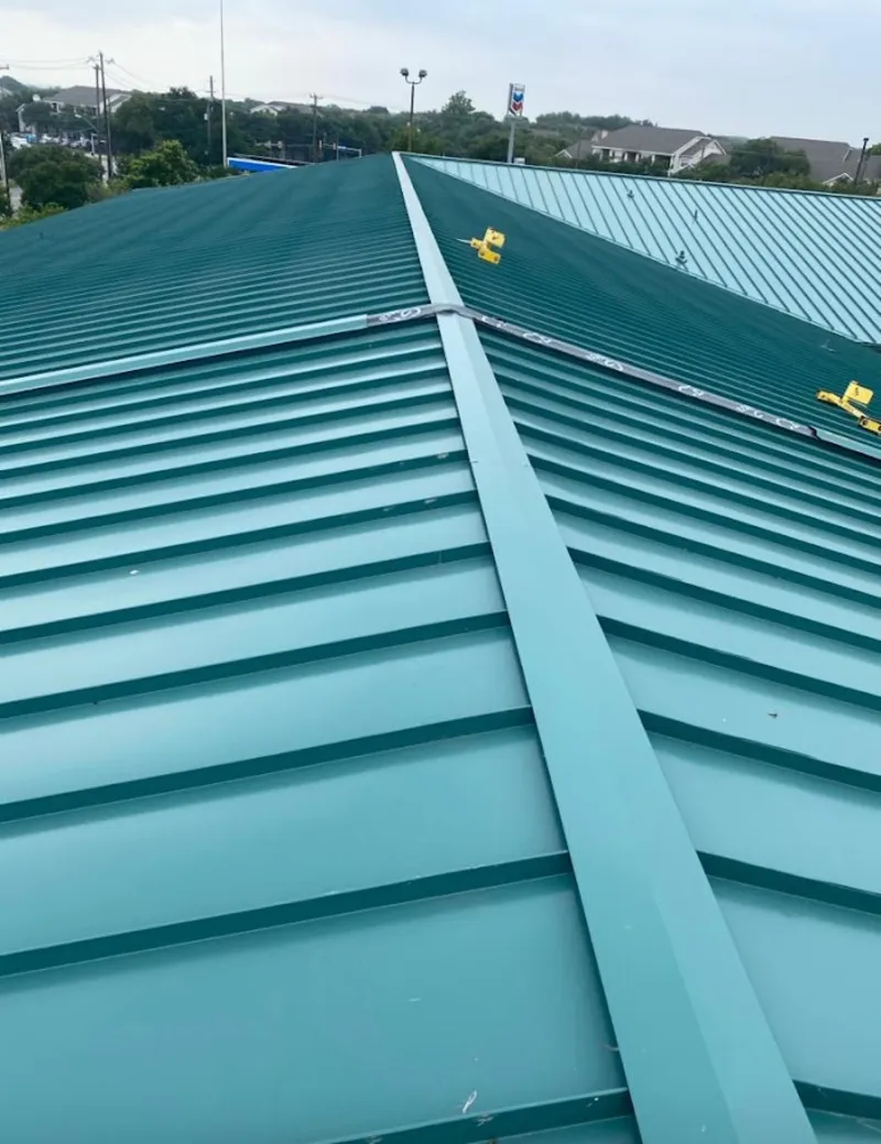 Green commercial metal roof ridge and valley for Metal Roof Repair in Port Lavaca