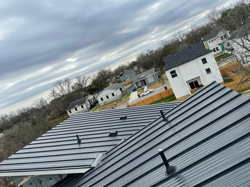 Standing seam metal roof panels with vents for Skylight Repair in Port Lavaca